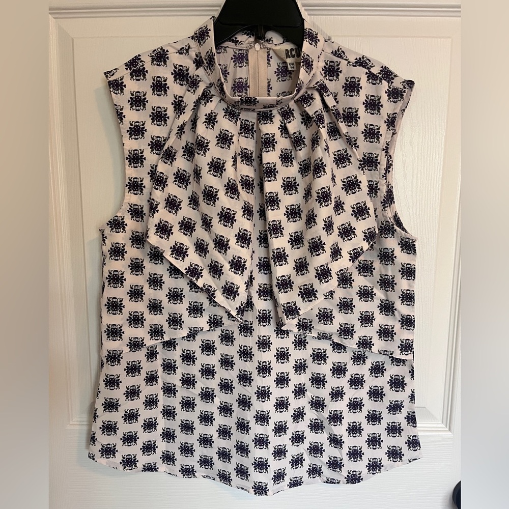 Ruffled Sleeveless Blouse